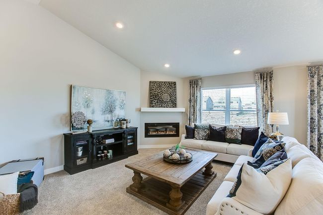 Gather in your nice sized living room and set the mood with your new electric fireplace. Options and colors may vary. | Image 6