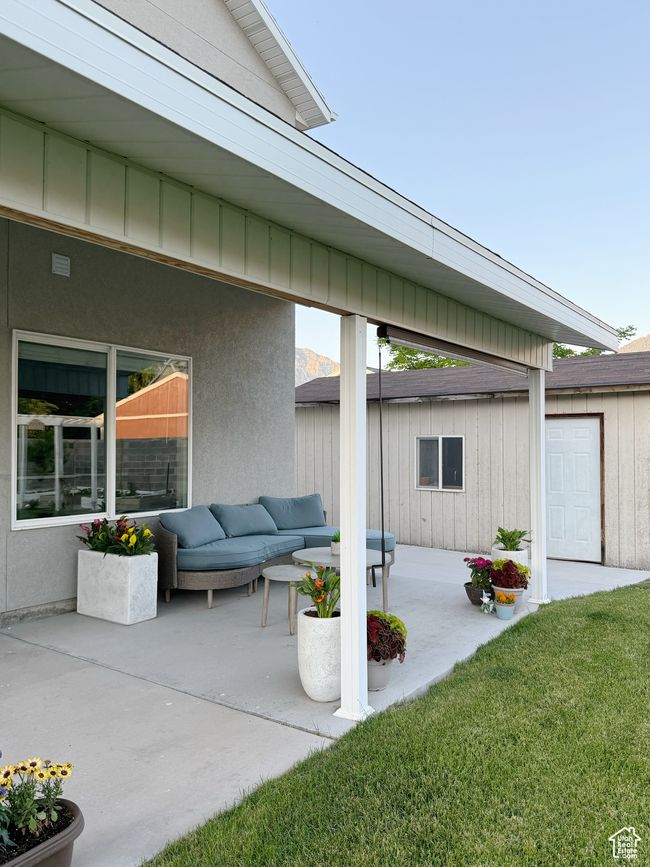 View of patio with an outdoor structure and an outdoor living space | Image 27