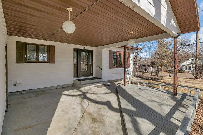 Great Curb appeal with beautiful covered front porch to enjoy your coffee in the morning sun and your favorite beverage in the evening shade | Image 4