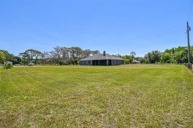 15513 Phillips Rd, House other with 4 bedrooms, 3 bathrooms and null parking in ODESSA FL | Image 96