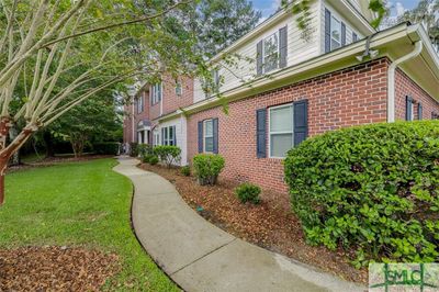 401 River Oaks Drive, Condo with 3 bedrooms, 2 bathrooms and null parking in Richmond Hill GA | Image 2