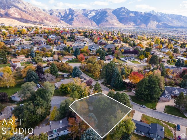 View of property location featuring property parcel outlined, mountains, and nearby suburban area | Image 59