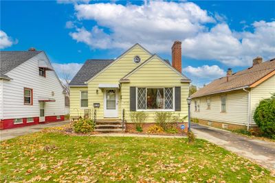 Bungalow-style house with a front yard | Image 1