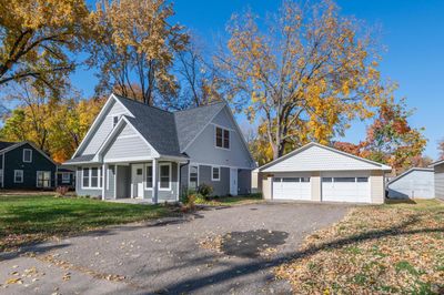 The home is set on a quiet street across from Highland Park and the location is just a few blocks from Surfside Beach on Cooks Bay of Lake Minnetonka! | Image 1