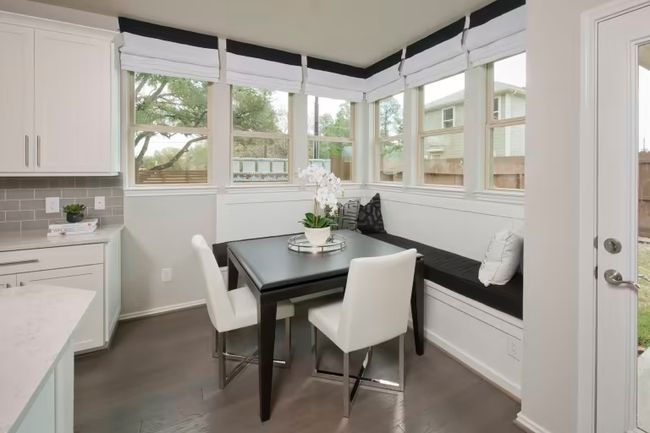 Photo of Pulte model home with same floor plan, not of actual home listed. | Image 7