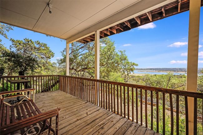 Step out doors to this inviting, private wooden deck....the perfect place to start and end your day! | Image 37