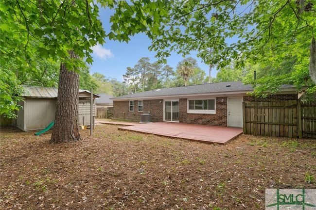 Backyard with Deck and Shed and Playset | Image 28