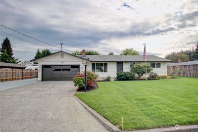 New sod and landscaping in the front yard. Loads of parking space. | Image 2