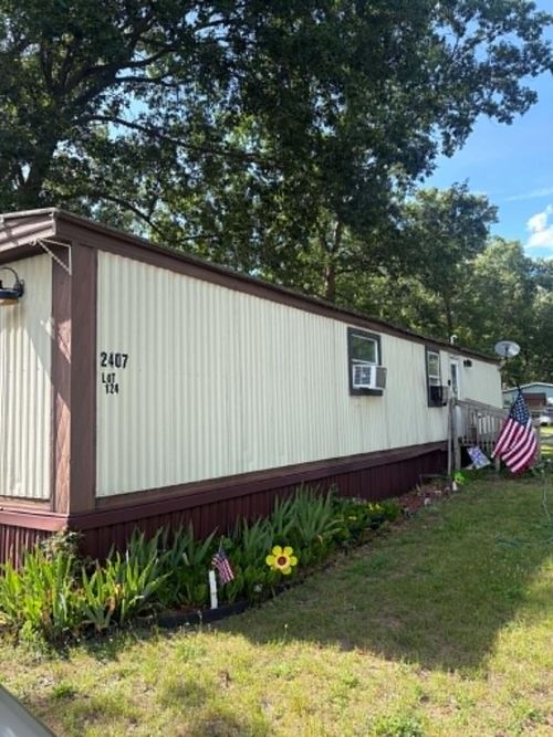 2407 Maple Rd, Twin Lake, MI, 49457-9228 | Card Image