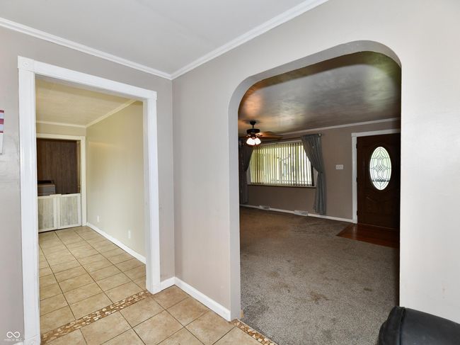 Entry to kitchen and to the left hallway to bedrooms. Hallway is extra large. | Image 10