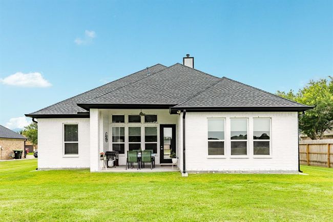 Step into the backyard oasis, with alarge covered patio, creating aninviting outdoor retreat. | Image 30