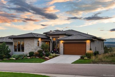 Located in the coveted Village at Castle Pines community, this 4 BR | 4 BA home demands your full attention. | Image 1