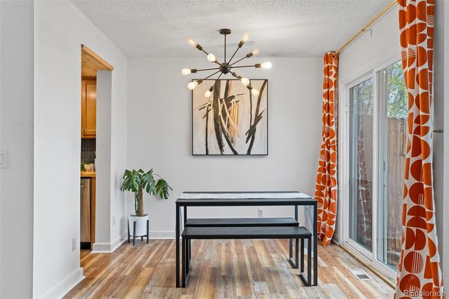 Dining room with slider door to back deck | Image 8