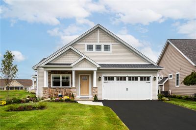 The Patio B Manor in Fort Plain features Hardy Board Siding, Marvin Windows, Landscaping and Sprinkler System. | Image 1