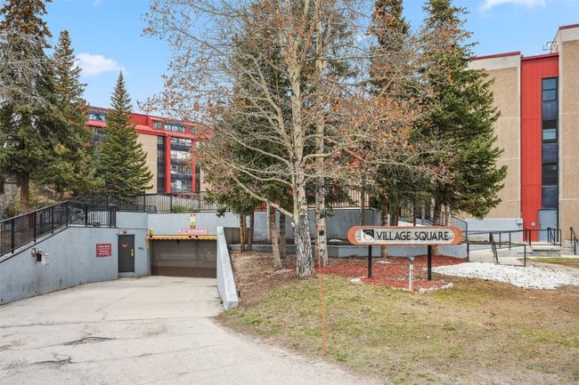 View of front facade featuring a garage and concrete driveway | Image 36