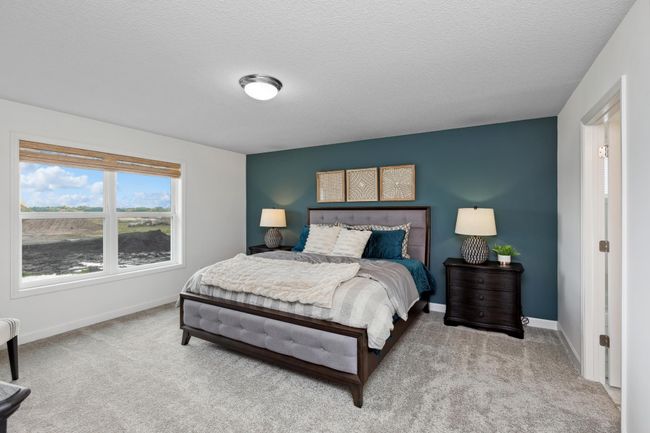 Photo is of the actual model. Find your retreat in this stunning primary bedroom. Enjoy the exclusivity of a private bath and huge walk-in closet. | Image 14