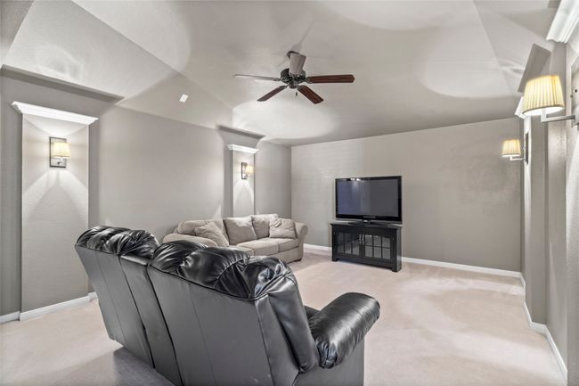 Large media room. Inside the media room is access to a walk-out storage room. | Image 24