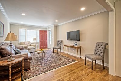 Enter through the front door into this charming living room. Highlighted with Hardwood floors and new recessed lighting. | Image 2