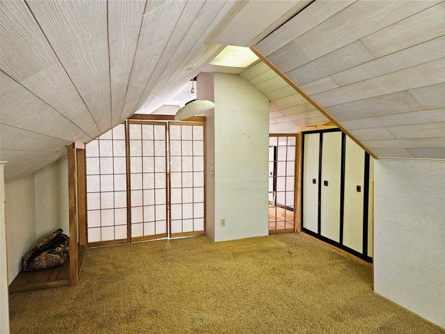 Additional living space featuring carpet flooring, vaulted ceiling, and wood ceiling | Image 19