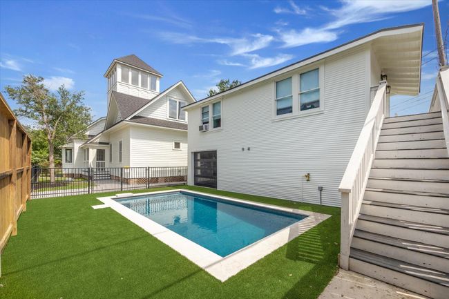 View of gorgeous pool and turf area | Image 41
