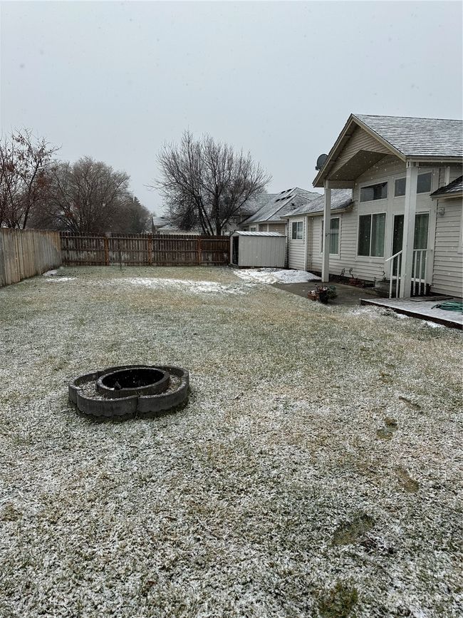 Backyard with Storage Shed | Image 15