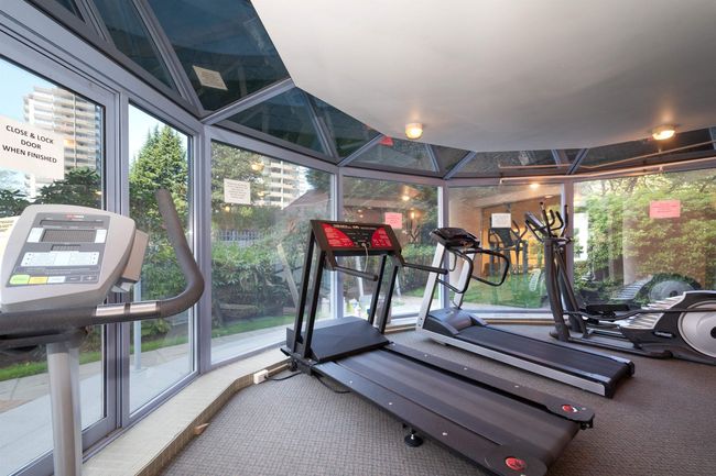 Workout area with expansive windows | Image 35