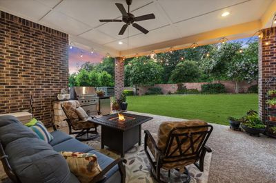 Extended roofline covered patio with outdoor kitchen | Image 2