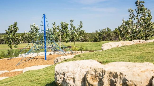 View of property's community with a lawn | Image 24