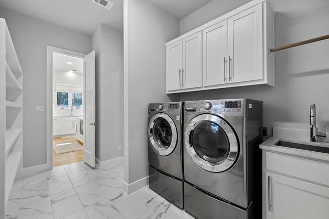Another angle of pantry / laundry area facing the kitchen | Image 10