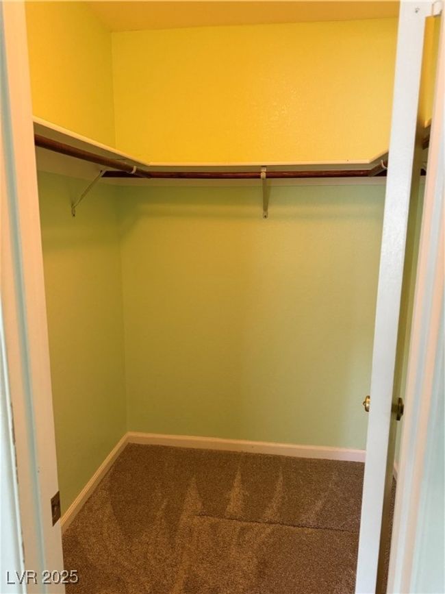 Walk in closet featuring carpet flooring | Image 19