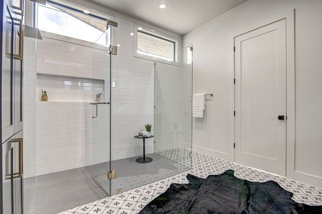 Bathroom featuring a stall shower and recessed lighting | Image 12