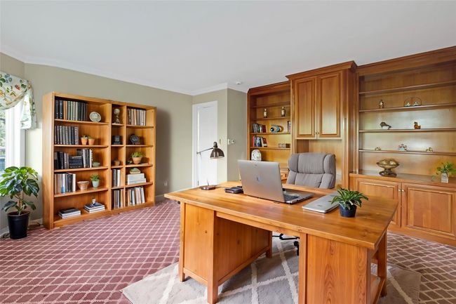 Office space with ornamental molding and light carpet | Image 4