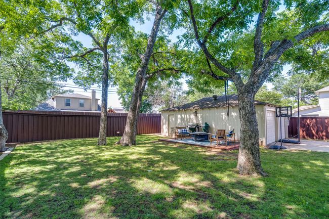 View of yard with a​​‌​​​​‌​​‌‌​‌‌​​​‌‌​​‌‌​‌​​​​​‌ patio | Image 22
