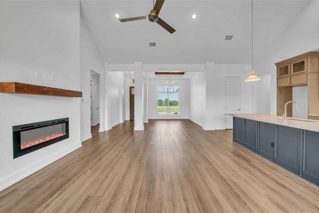 Please Note: These interior photos are not of the actual design, but are of a completed design with a similar floor plan. Finishes, features, and layouts may vary. | Image 4