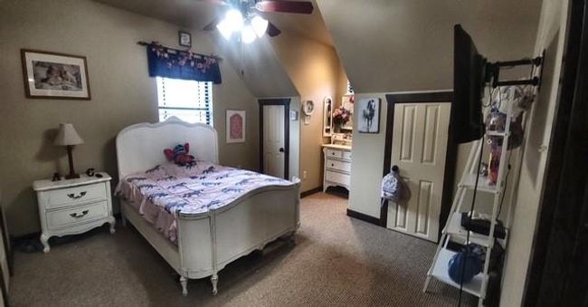upstairs bedrooms are spacious with large windows allowing for natural light | Image 13