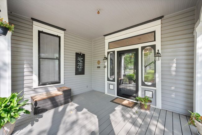 Doorway to property with a porch | Image 4