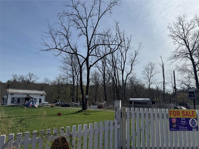 View of yard featuring fence | Image 36