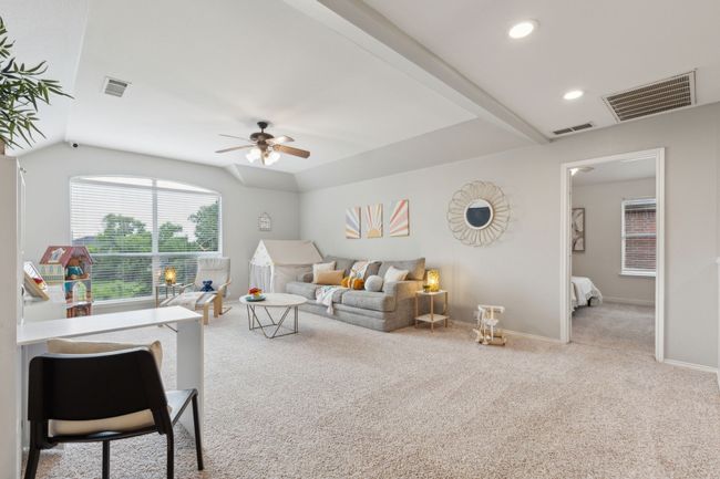 Living area with carpet, ceiling fan, baseboards, and recessed lighting | Image 22
