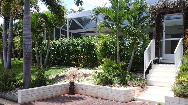 View of yard featuring a lanai | Image 36