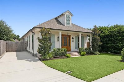 417 Nursery facade with driveway and vehicle accessible gate. | Image 2