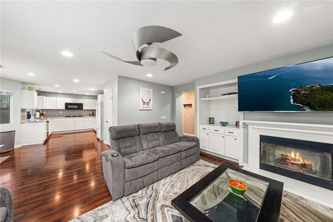 Family Area with Gas Fireplace and Built-In Storage | Image 16
