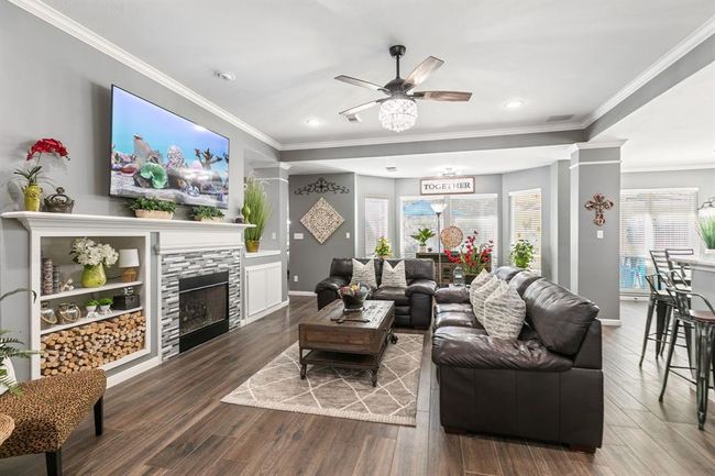 Your family gathering space! The room arrangement works well for entertaining or for everyday family comfort. | Image 12