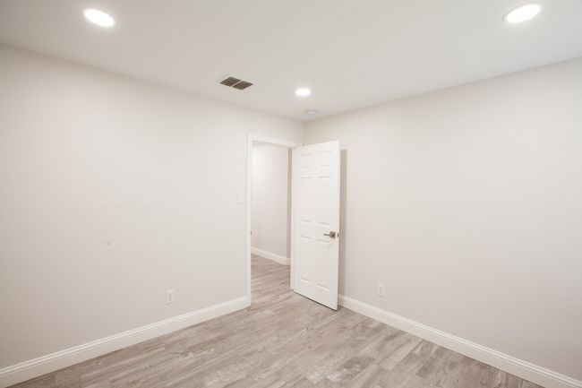 Unfurnished room featuring light wood-type flooring and recessed lighting | Image 35