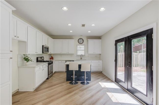 7653 Legacy Rd, House other with 4 bedrooms, 3 bathrooms and null parking in Flowery Branch GA | Image 12