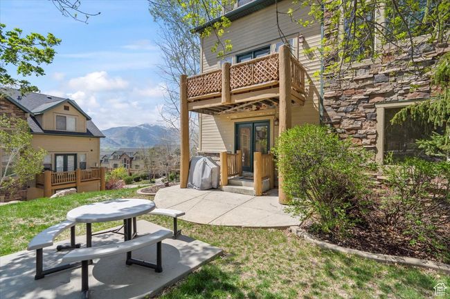 Exterior space with a mountain view, a patio area, french doors, and a balcony | Image 20