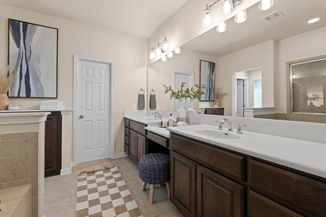 Full bathroom with two vanities and tile patterned flooring | Image 22
