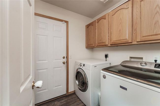 laundy/mud room off kitchen 1/2 bath here too | Image 13