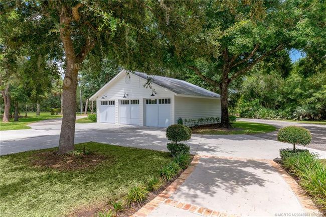 5906 Ludlum St, House other with 5 bedrooms, 5 bathrooms and 3 parking in Palm City FL | Image 18