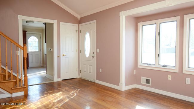 Entrance with Guest Closet. | Image 11