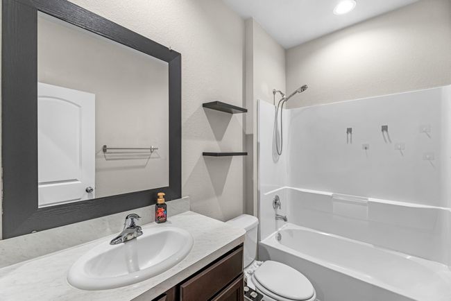 First floor full bathroom complete with bidet. | Image 12